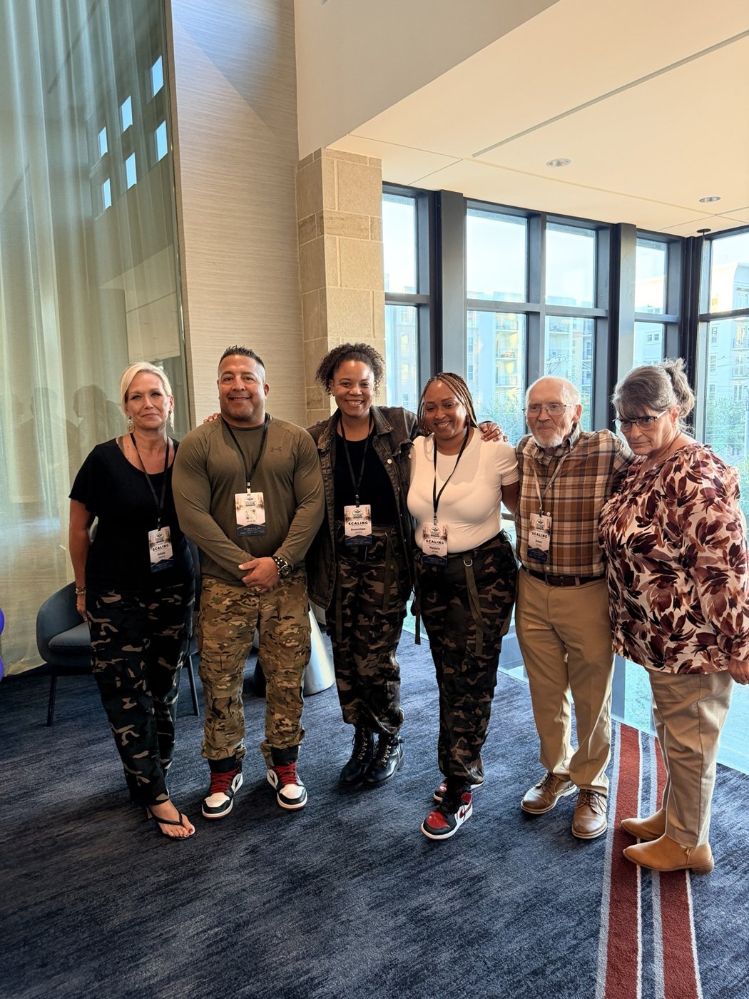 Marquita and members of her team at a mastermind