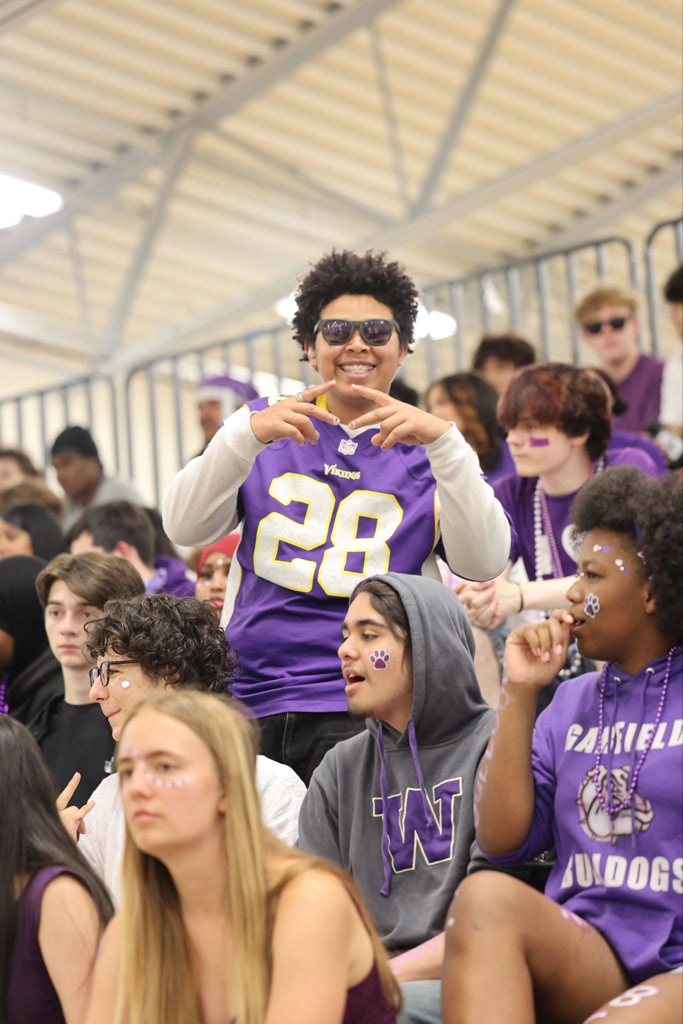 Marquita’s teenage son attending a school event
