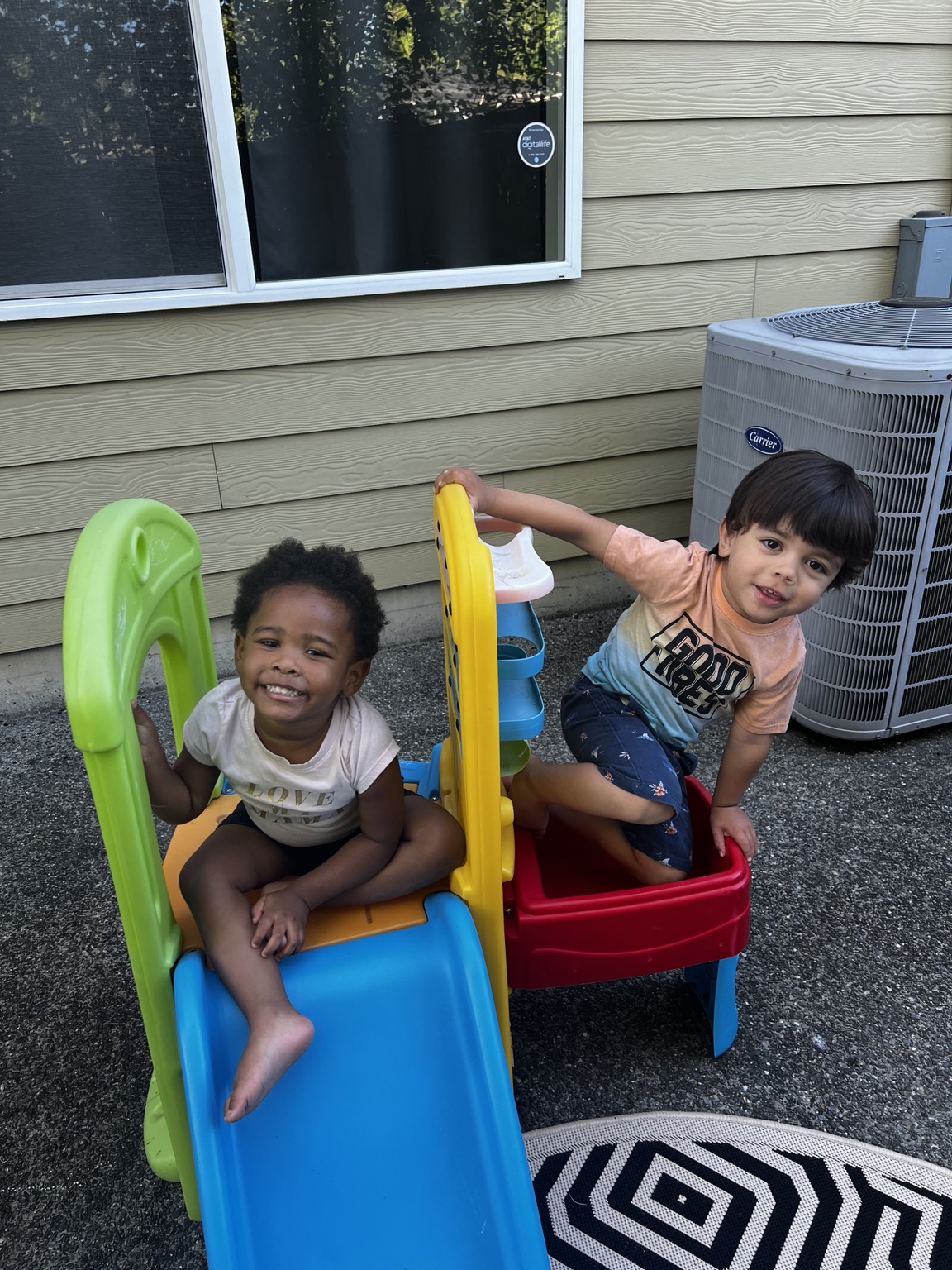 Two young children playing together